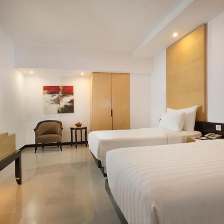 Hotel Santika Premiere Маланг Номер фото