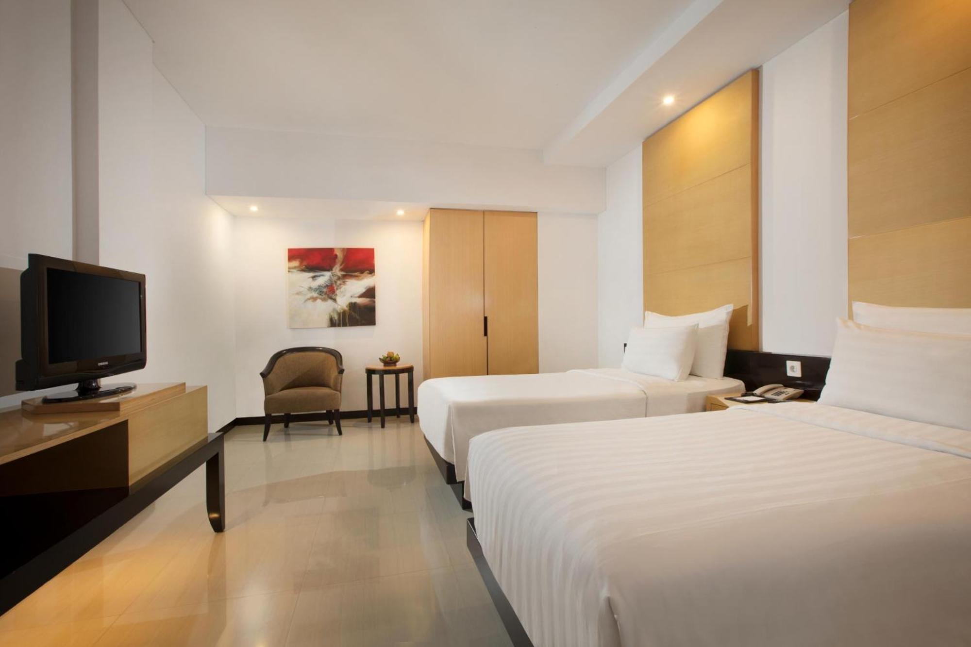 Hotel Santika Premiere Маланг Номер фото